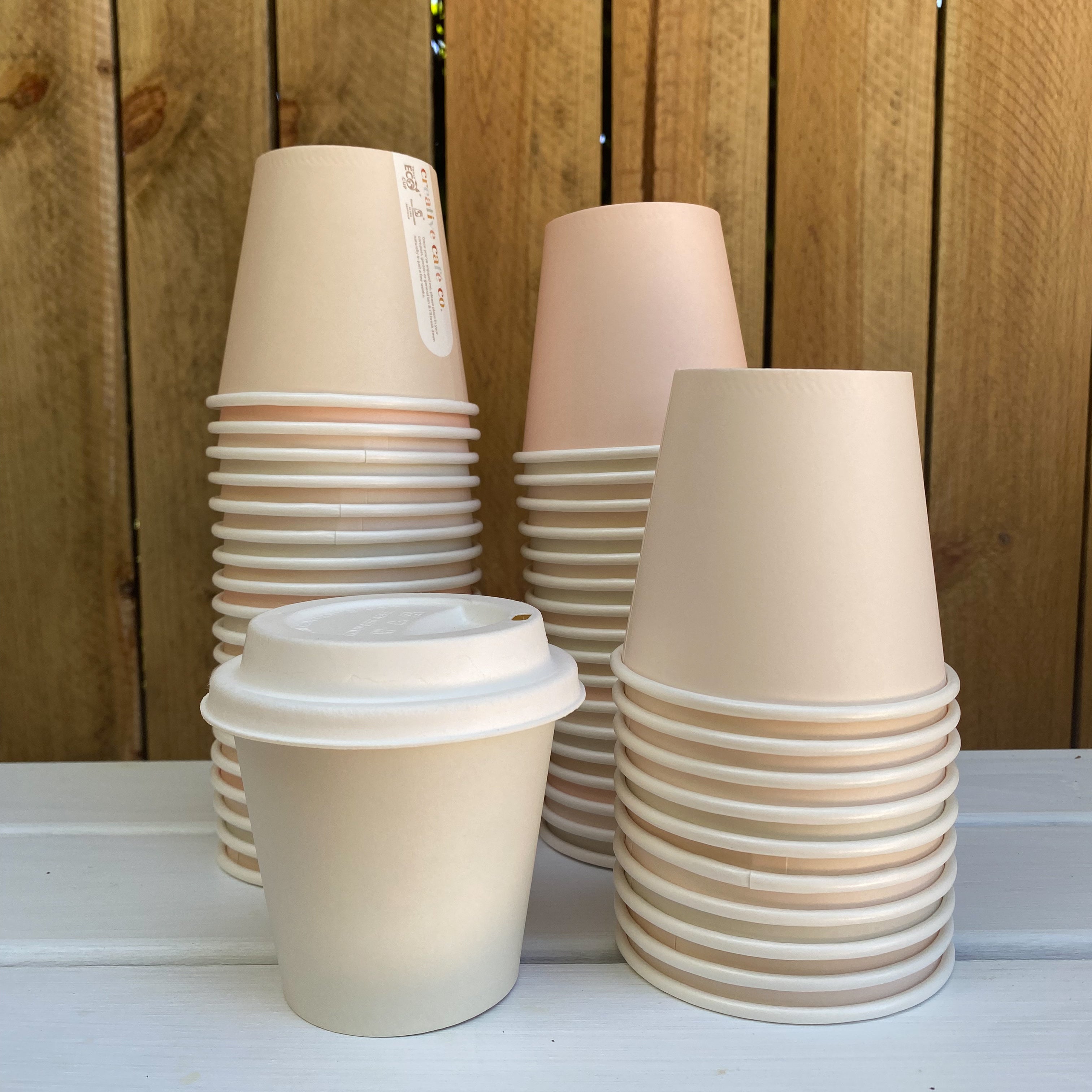plain takeaway coffee cups white coffee cups stamp home compostable Pastel tones peach green latte light disposable paper aqueous coffee cups